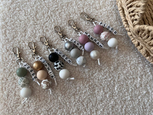 Sleutelhanger Klein witte letters